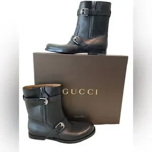 Gucci motorcycle boot it’s a size 9 but it ran a size larger. Gucci GG Logo Leather Marmont Moto Boots Black Brown main image 3